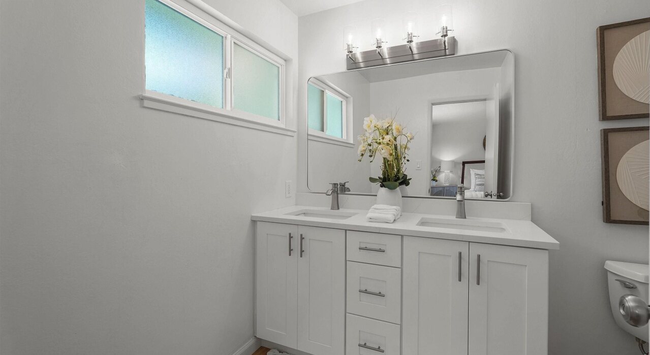 Douglass Street bathroom double vanity and mirror
